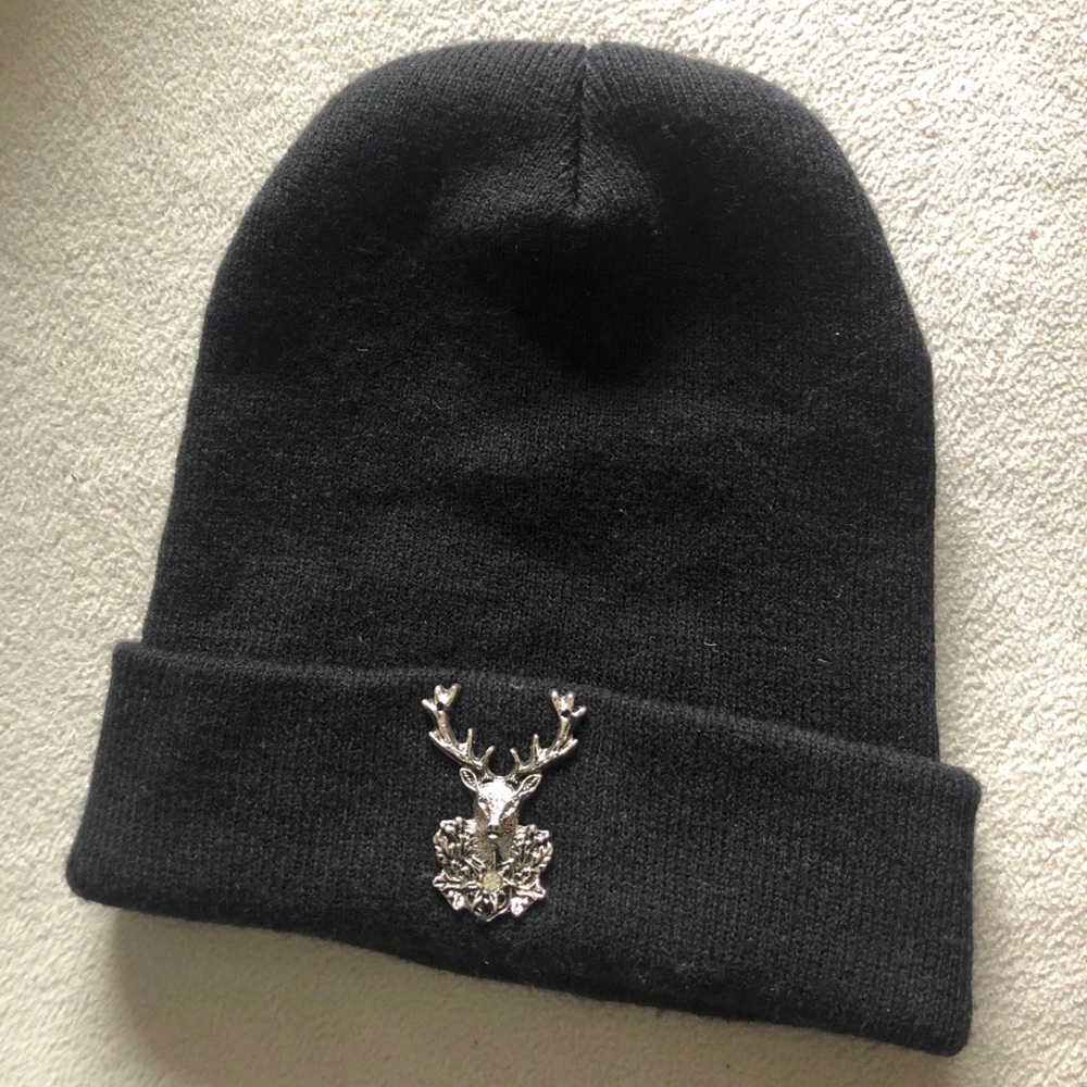 Black beanie with a dear.